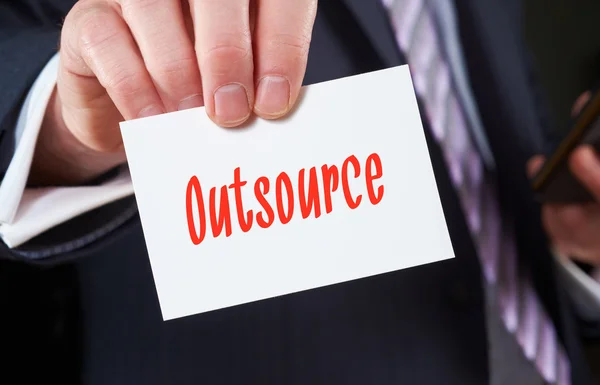 Outsource written on card — Stock Photo, Image