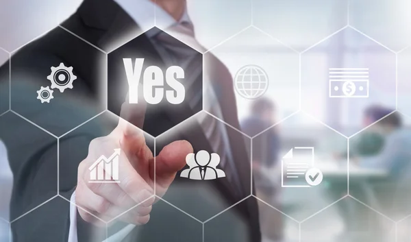 Businessman pressing a Yes button. — Stock Photo, Image