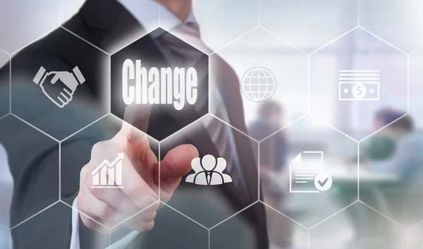 Businessman pressing a Change button. — Stock Photo, Image