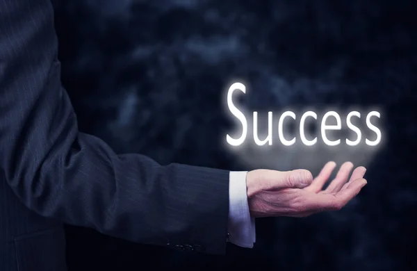 Hand met woord succes. — Stockfoto