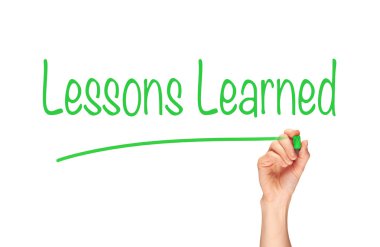 Hand writing Lessons Learned Concept