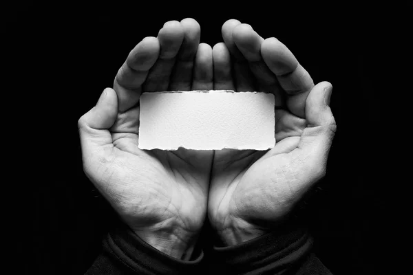 Message card in cupped hands. — Stok fotoğraf