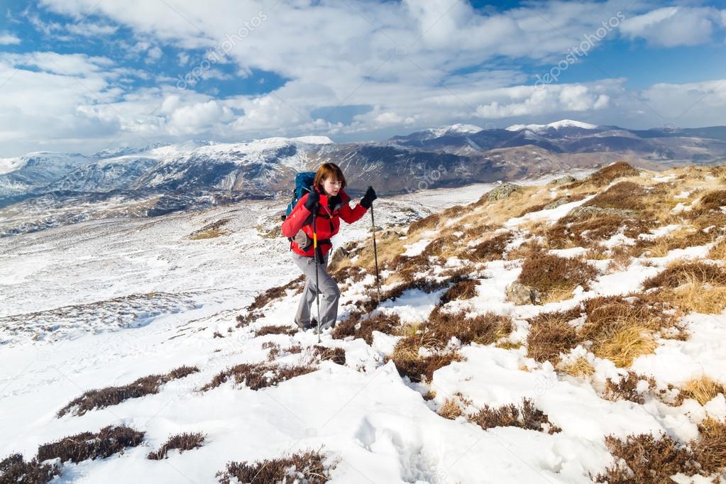 Female hiker on way to summit