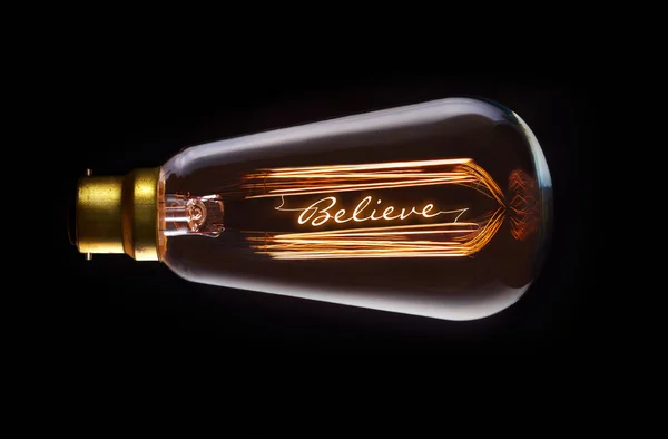 Religion, Concept de foi dans une ampoule à incandescence — Photo