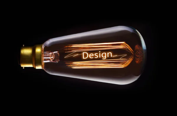 Design Concept in retro filament lightbulb — Stock Photo, Image
