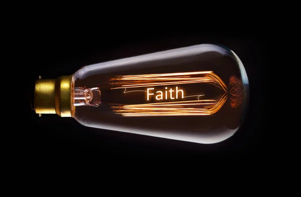 Religion, Concept de foi dans une ampoule à incandescence — Photo
