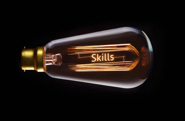 Skills Concept in retro filament lightbulb — Stock Photo, Image