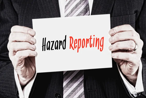 Black and red inscription Hazard Reporting — Stock Photo, Image