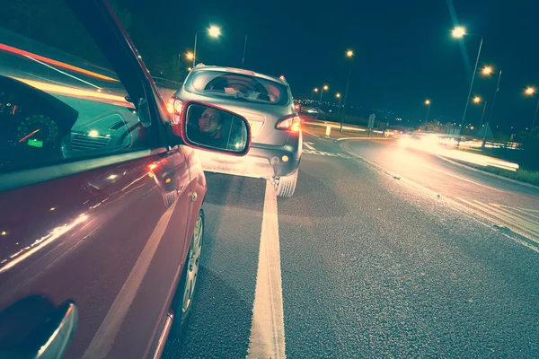 Car stuck in traffic at night. — Stock Photo, Image