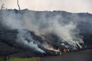 Hawaii's Kilauea volcano spews lava through Leilani Estates Hawaii  clipart
