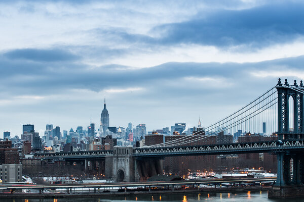 NEW YORK - January 20, 2014: New York Manhattan from Brooklyn Bridge.