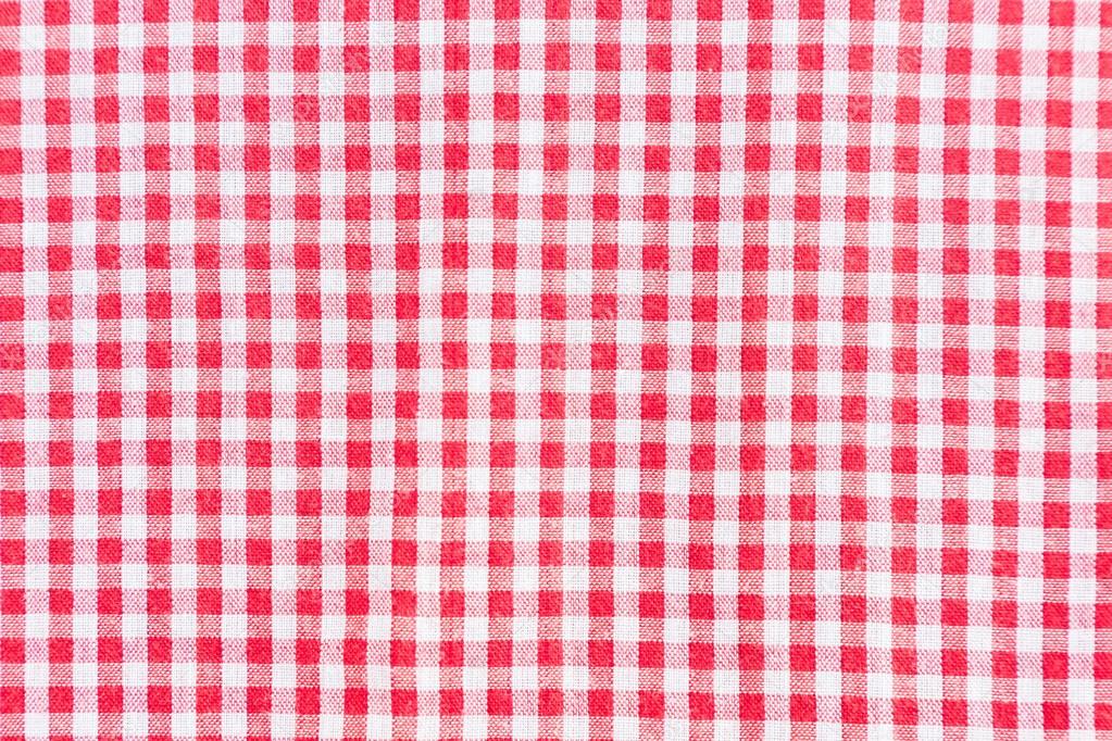 Red classic checkered tablecloth texture, background with copy space