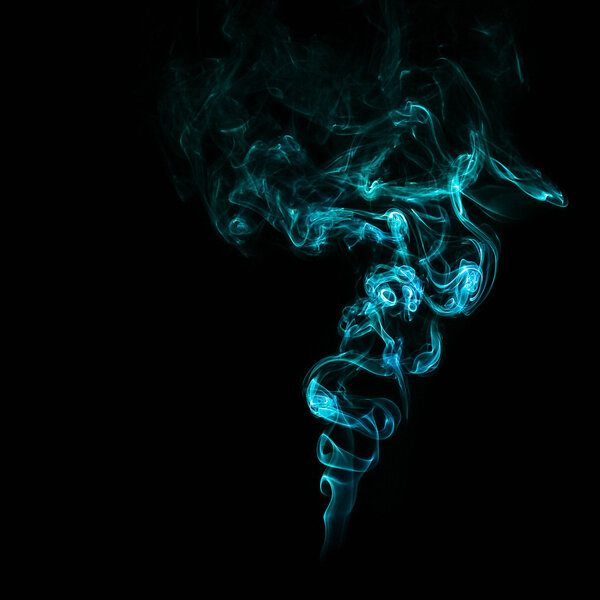A smoke on a black backround coloured in blue