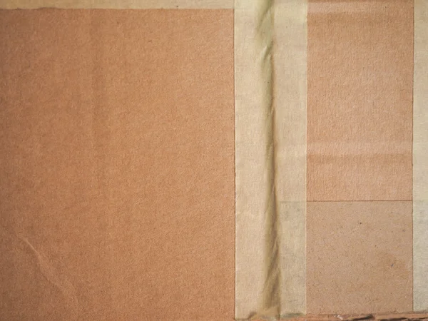 Brown grunge cardboard background — Stock Photo, Image