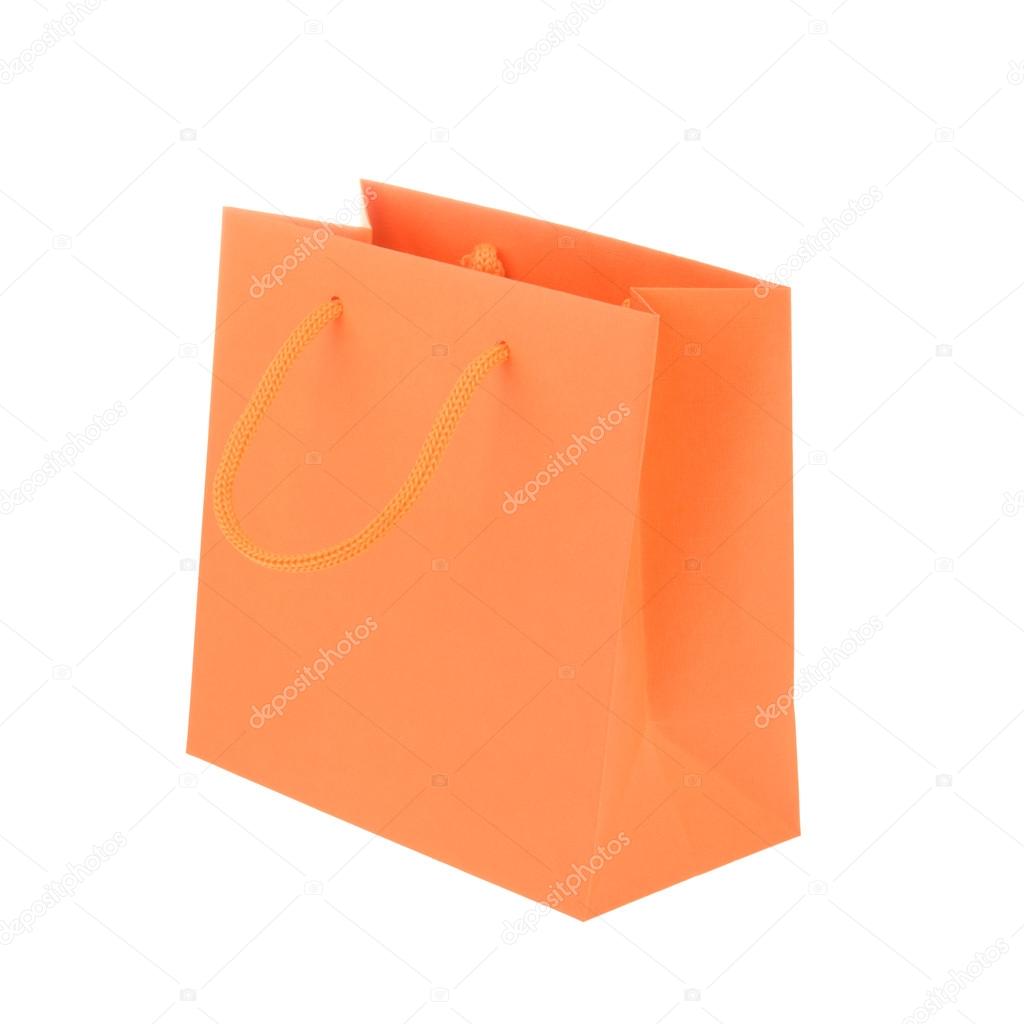 Orange paper shopping bag isolated