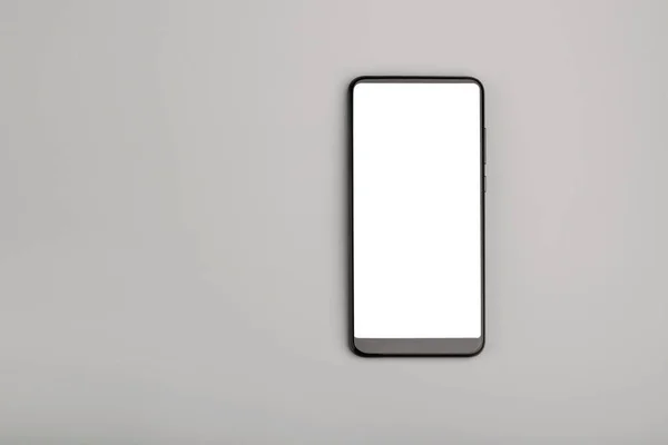 Smartphone Gerät Auf Grauem Hintergrund Von Oben — Stockfoto