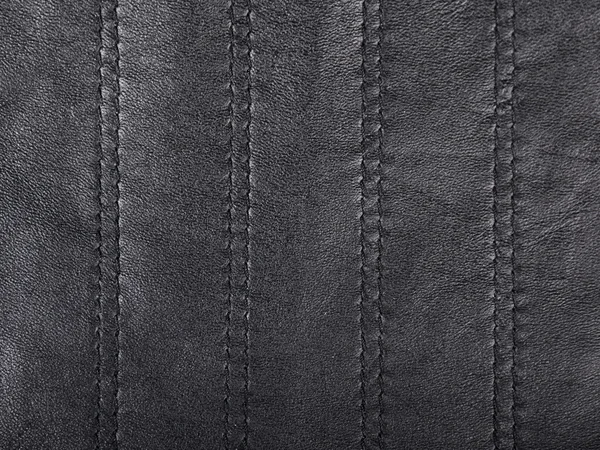 Black leather background closeup — Stock Photo, Image