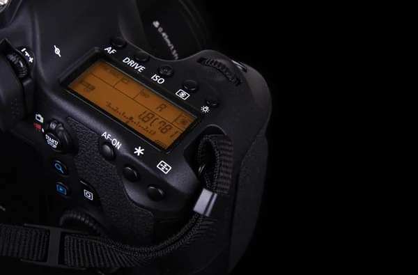 Professional modern DSLR camera low key image — Stock Photo, Image