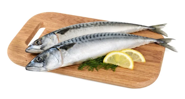Mackerel fish on wooden plate isolated — Stock Photo, Image