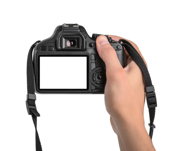 DSLR camera in hand geïsoleerd — Stockfoto