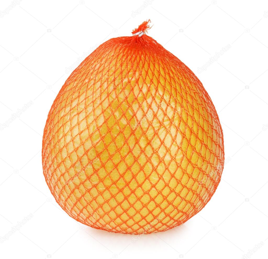Pomelo fruit wrapped in net and plastic foil isolated