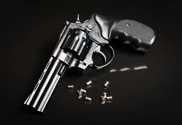 Revolver gun on black background — Stock Photo, Image