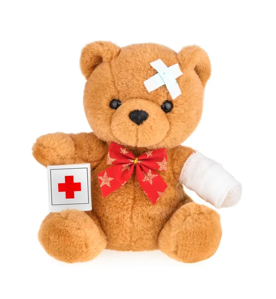 Nallebjörn med bandage isolerad på vit — Stockfoto