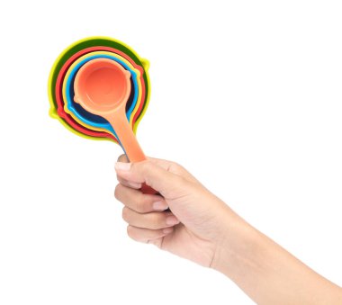 Beyaz arkaplanda izole edilmiş plastik kepçe takımı