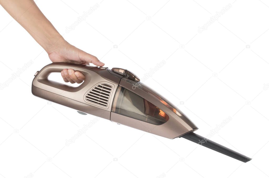Hand holding car vacuum cleaner isolated on white background