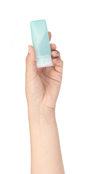 Mano Sosteniendo Una Pequeña Botella Plástico Productos Higiene Aislados Sobre —  Fotos de Stock