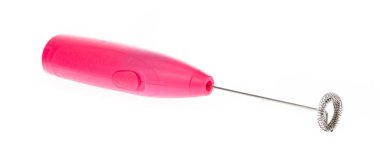 Pink electric milk frother isolated on a white background clipart