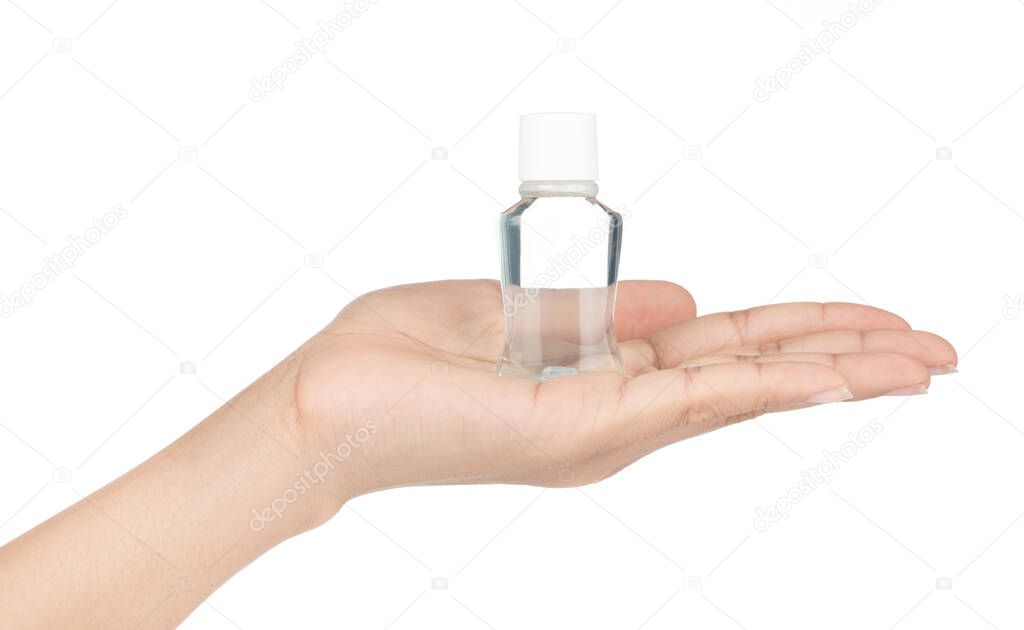 hand holding mini water mouthwash isolate on white background