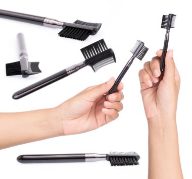 Kaşları taramak için el fırçası seti, beyaz arka planda izole edilmiş.