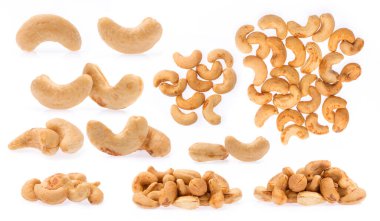 Beyaz arka planda izole edilmiş kaju fıstığı koleksiyonu.