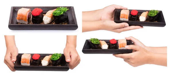 白地に隔離された盆の上で寿司を握る手のコレクション — ストック写真
