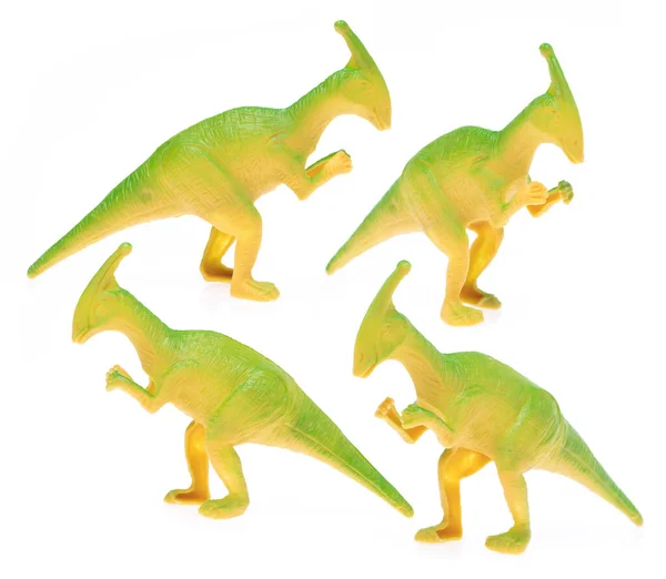 用塑料制成的抛物面螺旋体的集合 白色背景的恐龙玩具 — 图库照片