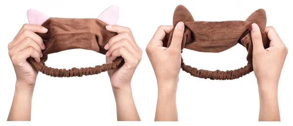 Conjunto Mão Segurando Brown Headband Com Orelhas Gato Isolado Fundo — Fotografia de Stock