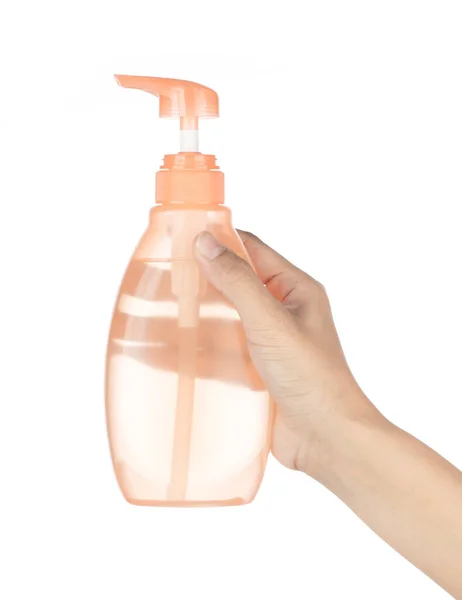 Hand Holding Orange Liquid Soap Bottle Isolated White Background — Stock Photo, Image