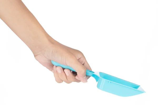 Ținând Mâna Blue Plastic Scoop Pet Sand Izolat Fundal Alb — Fotografie, imagine de stoc