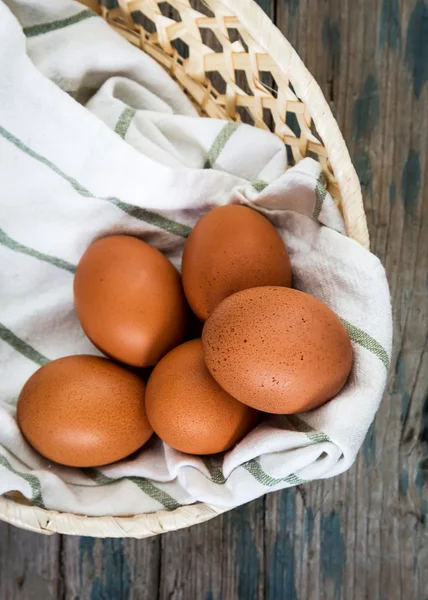 Red eggs in basket with napkin