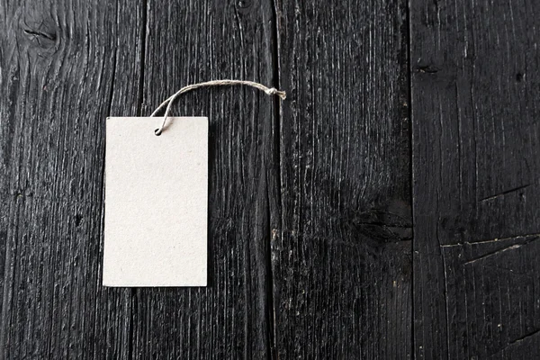 Papierabzeichen auf Holzgrund — Stockfoto