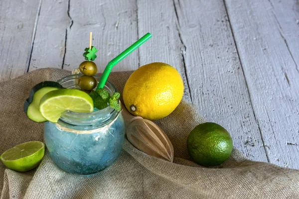 freshly made drink gin and tonic with lime and cucumber slices