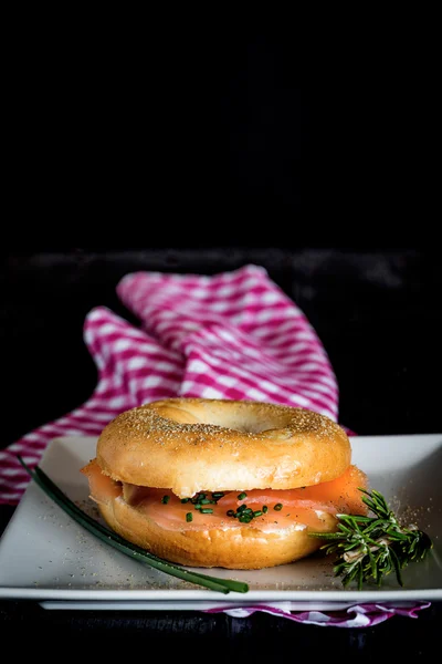 with a smoked salmon bagel and cream cheese