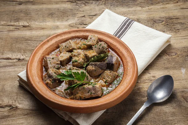 Traditional homemade fish tajin stew with potatoes. Moroccan food. Halal food
