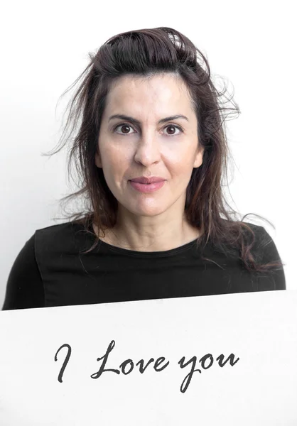 Mooie vrouw gebaren met blackboard geïsoleerd op witte achterzijde — Stockfoto