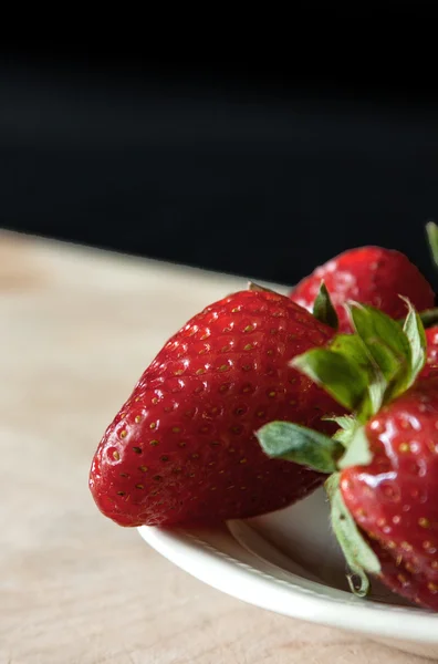 Beautiful strawberries on the wooden table — Stock Photo, Image