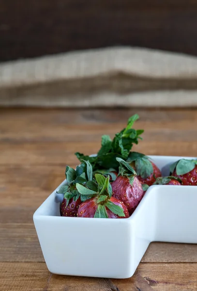 Beautiful strawberries on the wooden table — Stock Photo, Image