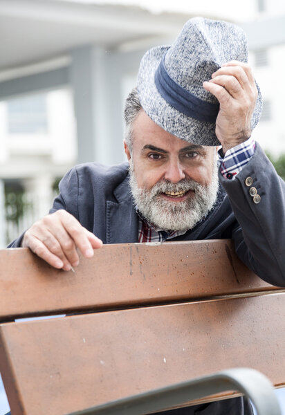 Attractive old man with beard and hat