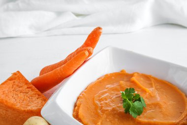 Mashed potatoes with onions carrots and pumpkin clipart