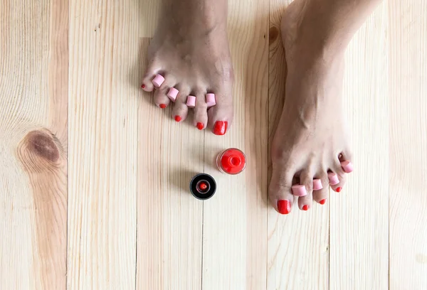 Woman painting toe nails — Stock Photo, Image